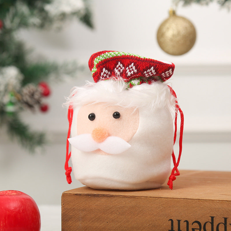 Cute Christmas gnome with gift sack Stornfield