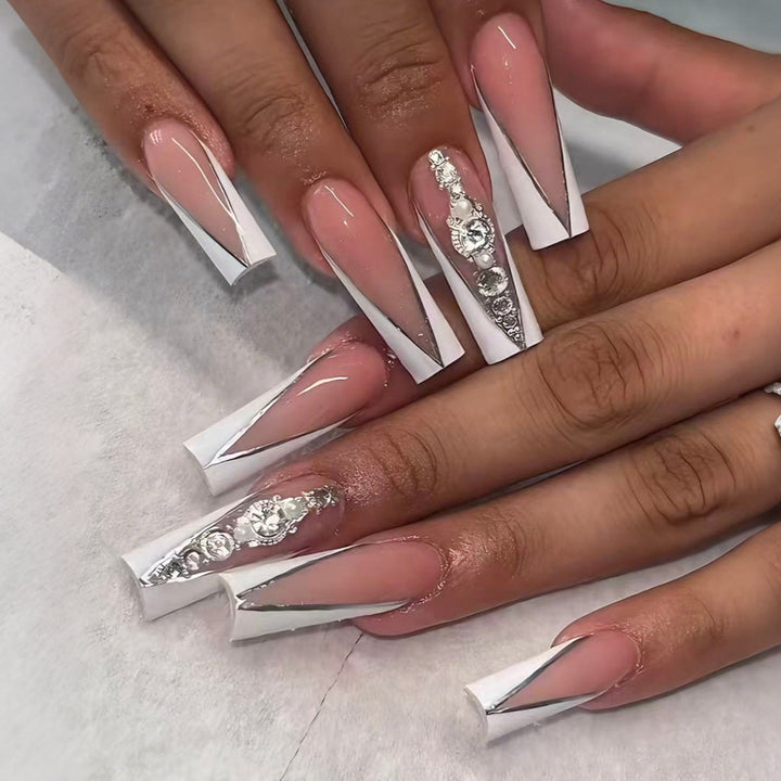 Artificial nails with elegant tips and glitter details Stornfield