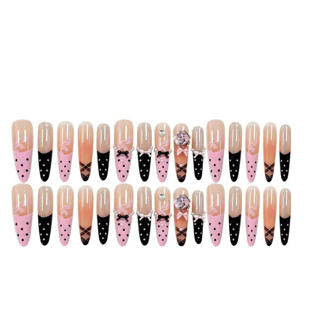 Artificial nail set with glamorous 3D applications and festive design Stornfield