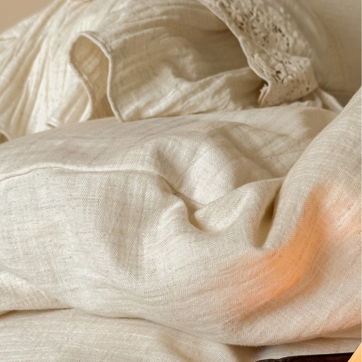 Vintage-inspired cotton-linen bedding set with ruffled frill and lace trim