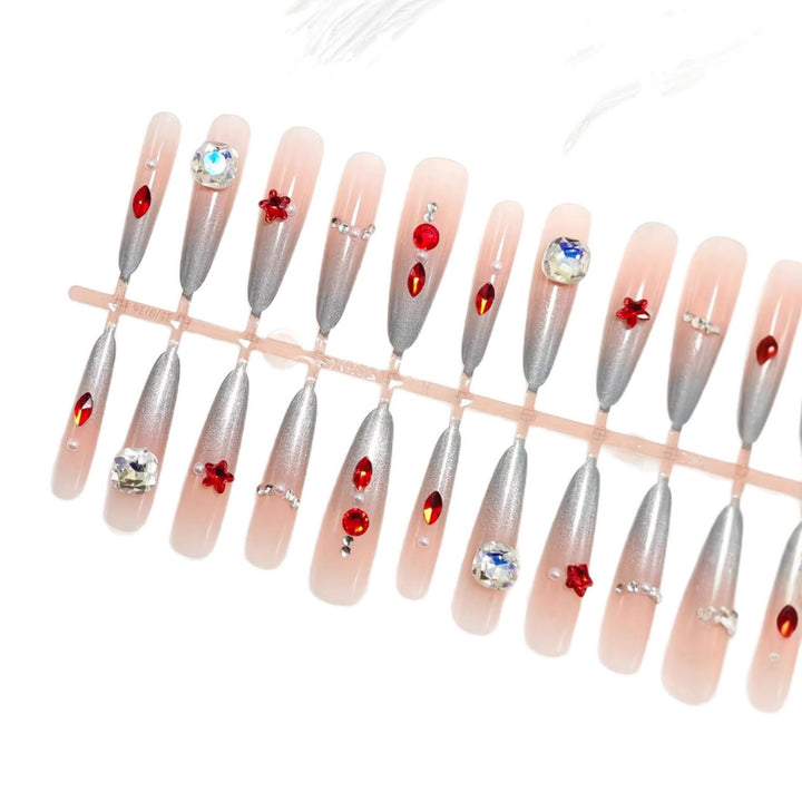 Artificial nails with glamorous glitter design and 3D applications Stornfield