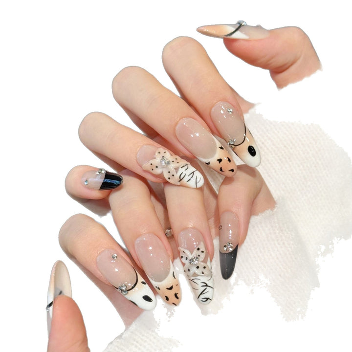 Artistic Press-On Nail Art Set with Elegant Designs
