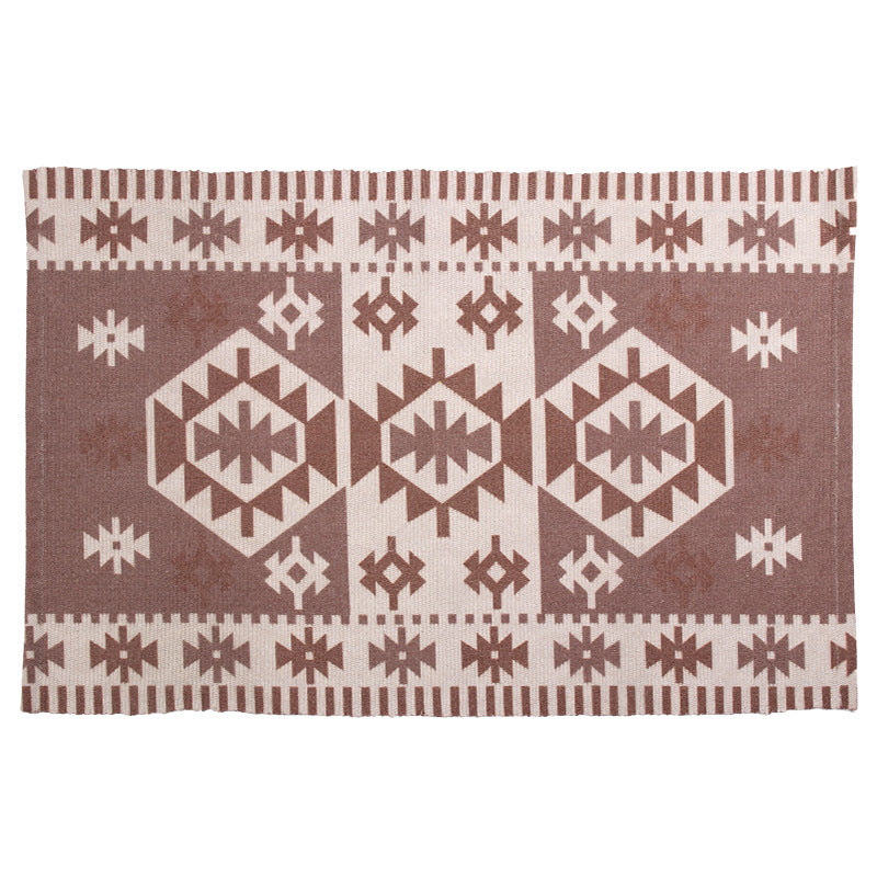 Flat-woven kilim rug with geometric ethnic pattern
