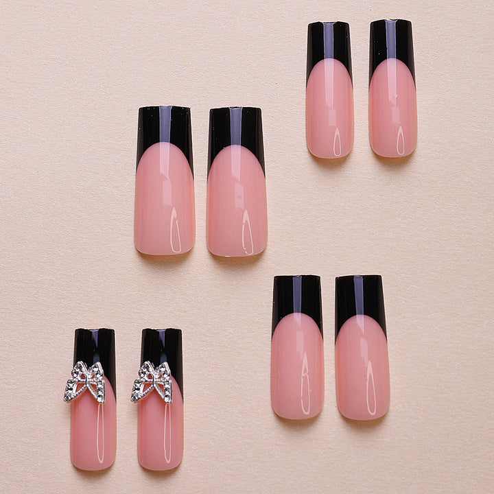 Acrylic nail set with elegant butterfly accents Stornfield