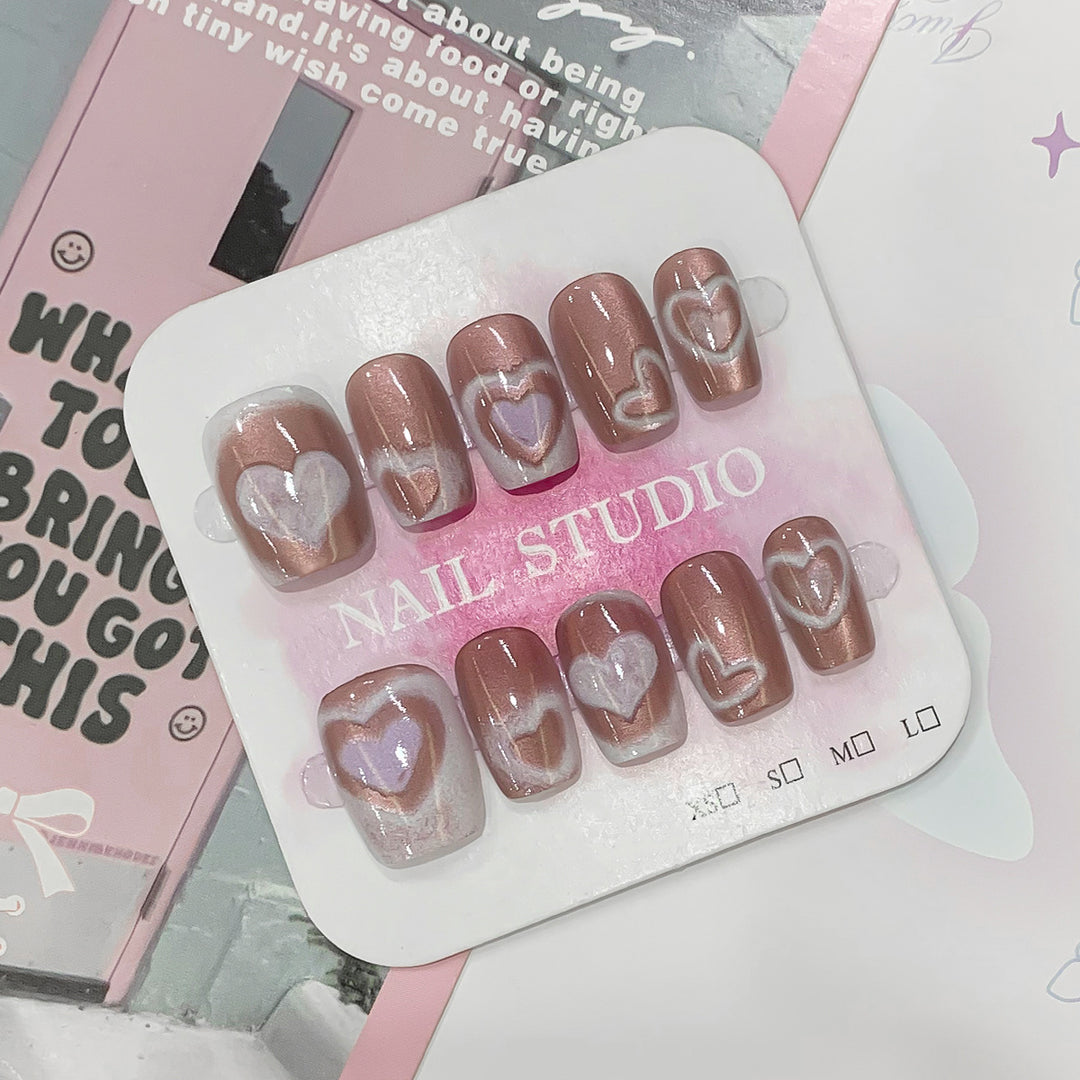 Artificial nail tips in heart design Stornfield