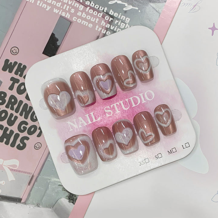 Artificial nail tips in heart design Stornfield