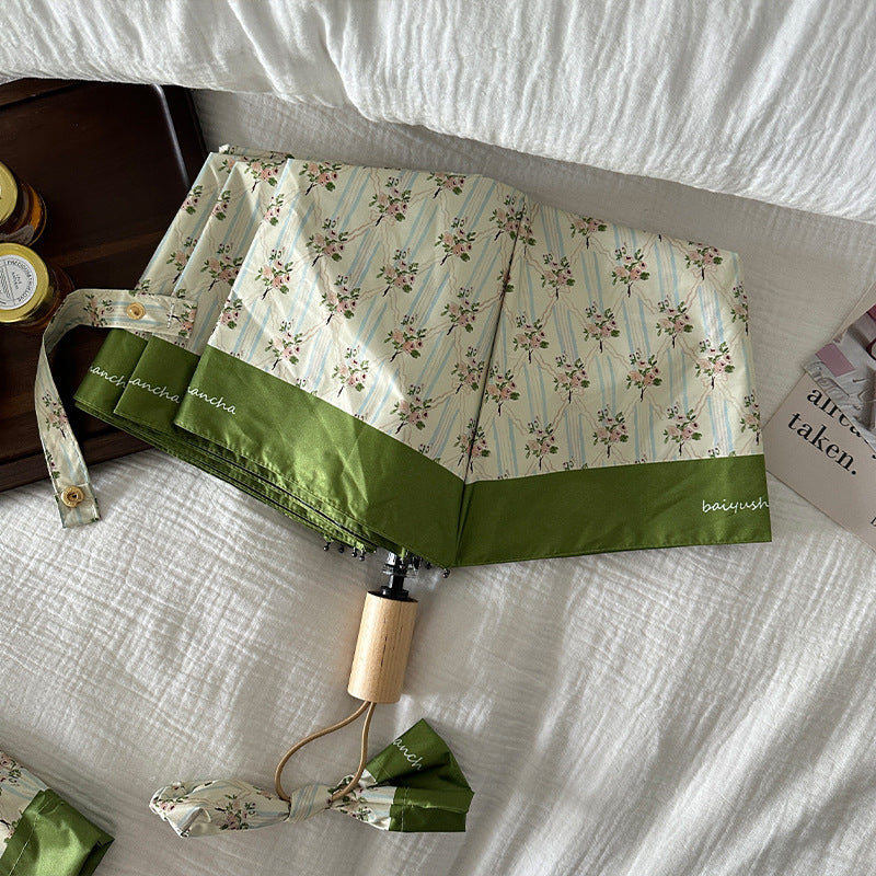 Ladies elegant folding umbrella with floral design Stornfield