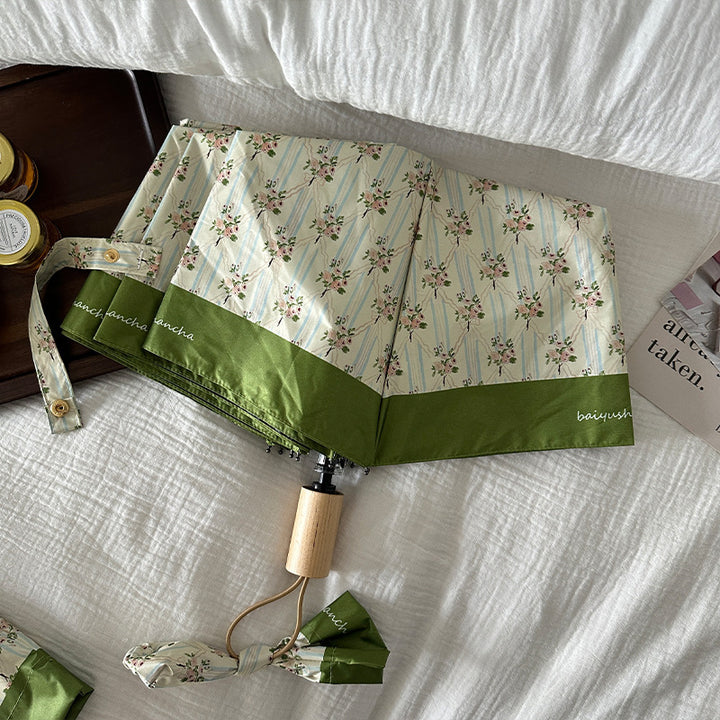 Ladies elegant folding umbrella with floral design Stornfield