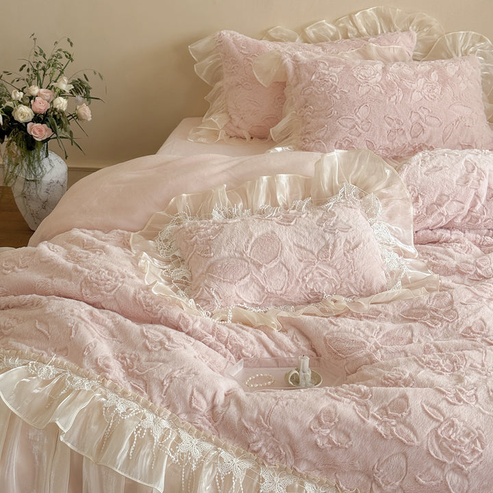 Ruffled satin bedding set with quilted floral relief