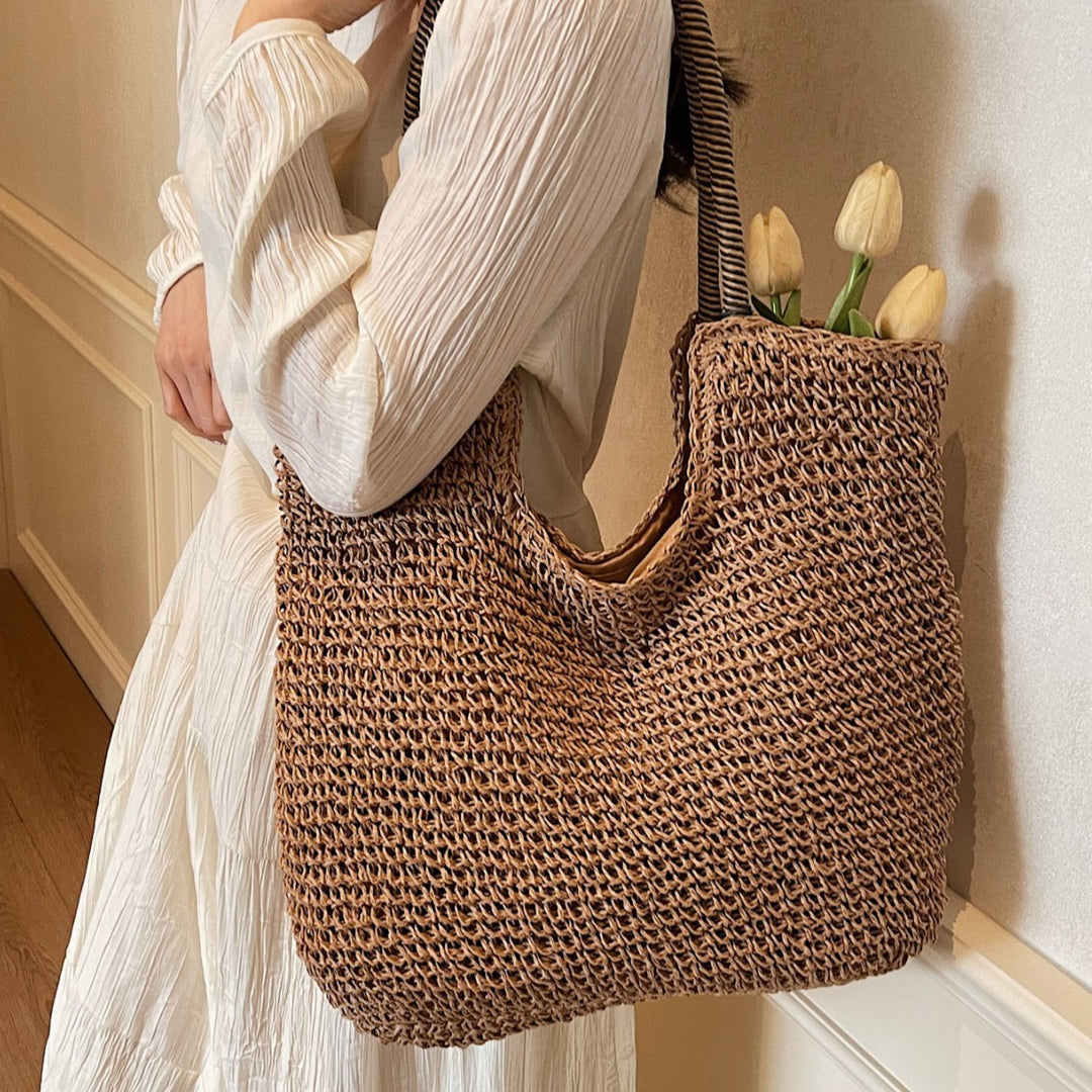 Elegant Handbag Made from Hand-Woven Natural Material with Striped Handles Stornfield