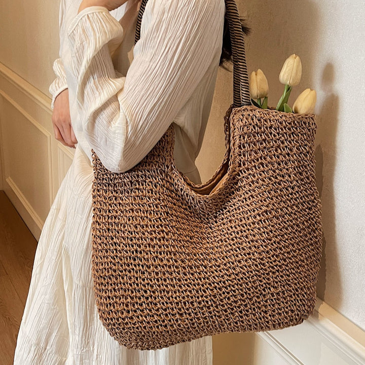 Elegant Handbag Made from Hand-Woven Natural Material with Striped Handles Stornfield