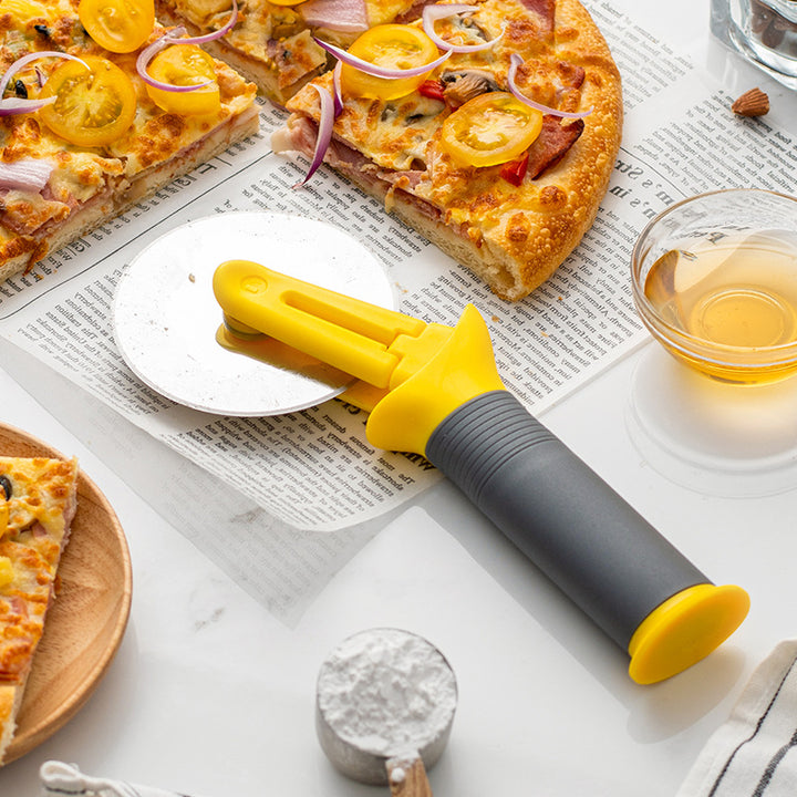 Ergonomic pizza cutter with safety mechanism Stornfield