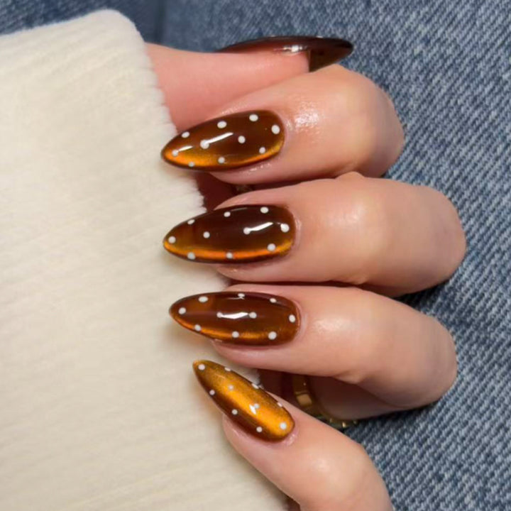 Artful nail extensions with glossy ombre effect and elegant dots Stornfield