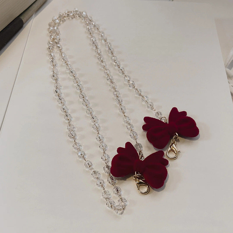Jewelry holder chain with velvet bow pendant Stornfield