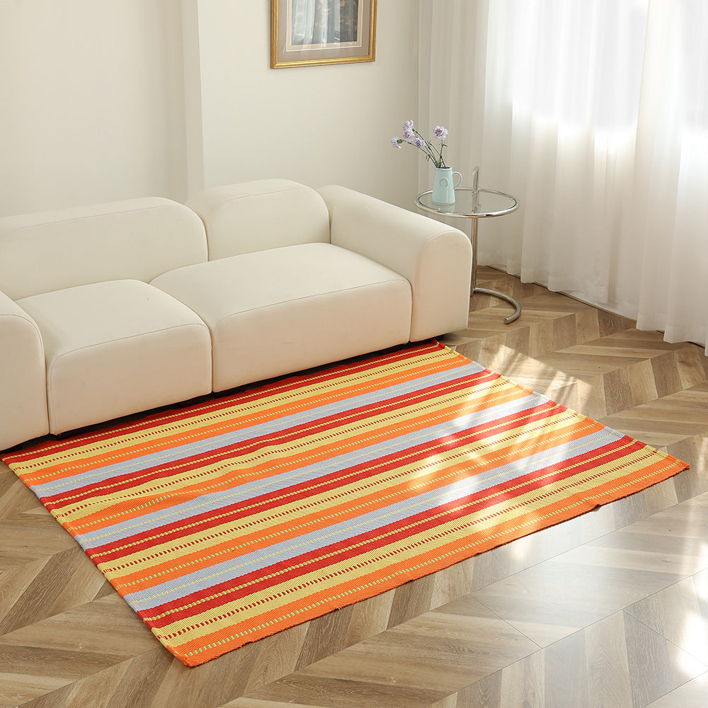 Flat-woven striped living room rug with low pile and non-slip backing
