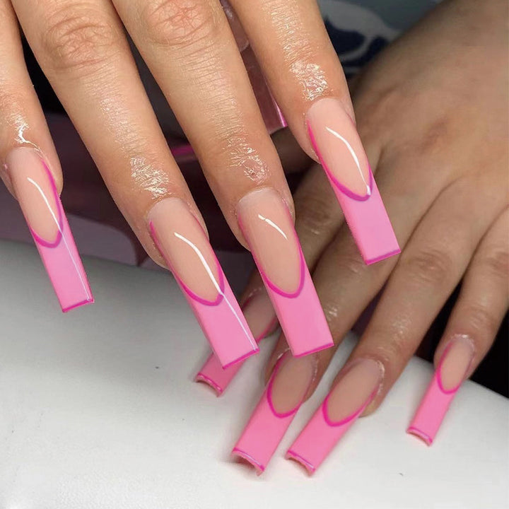 Artificial nail extensions with modern ombre design Stornfield
