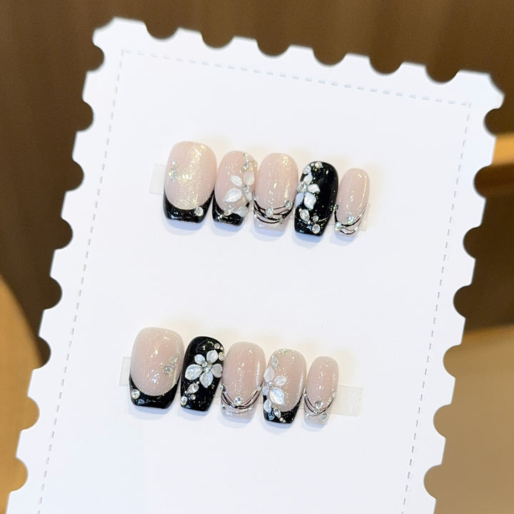 Exclusive artificial nails with floral accents and glitter coating Stornfield