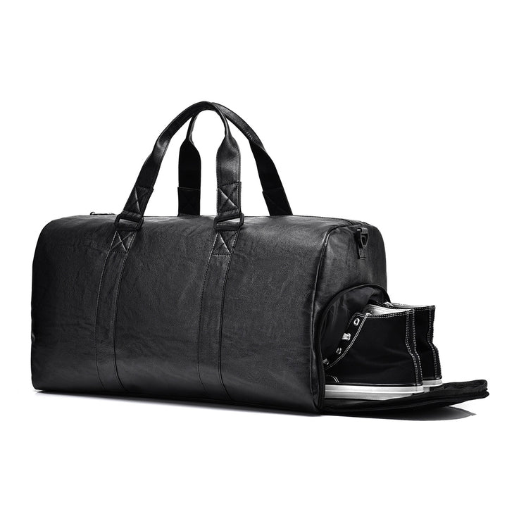 Travel bag made of high-quality leather with robust carrying handles Stornfield