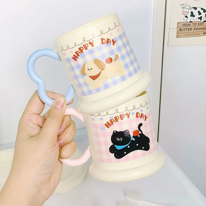 Ceramic mug with playful puppy motif Stornfield