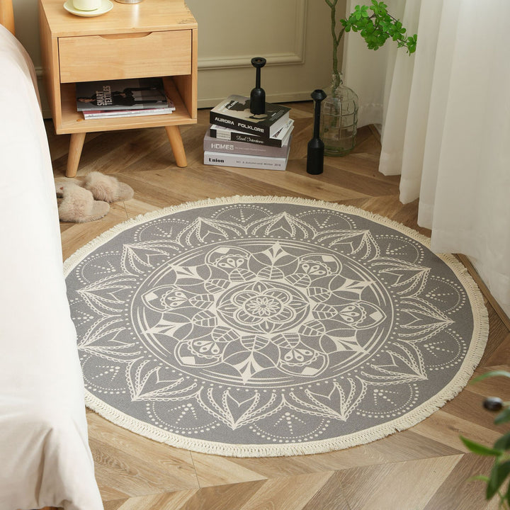 Round woven rug with mandala motif, flat cotton-jute mix and fringes Stornfield