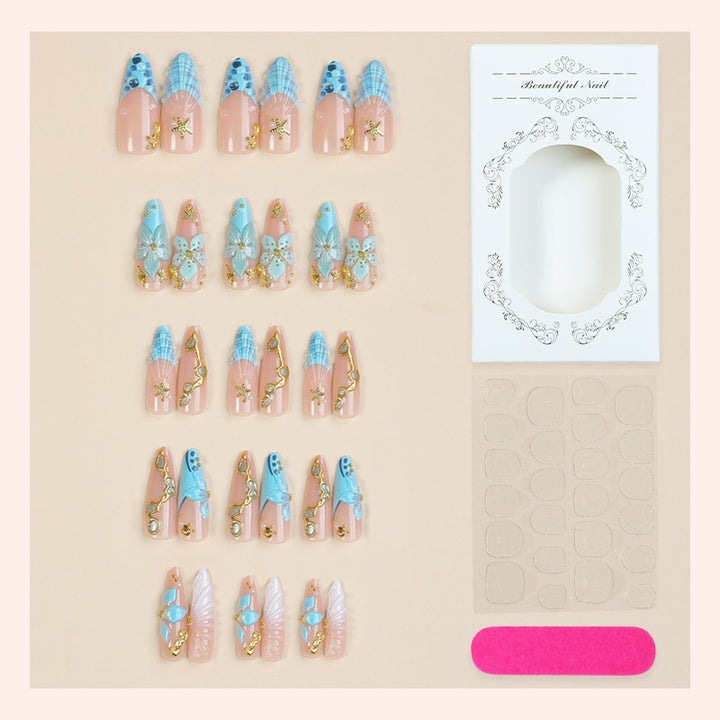 Artificial nail set with luxurious 3D designs and glitter accents Stornfield