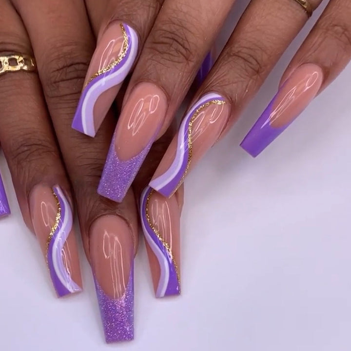 Glamorous French Tip Stiletto Press-On Nails Decorated with Glitter and Gold Accents Stornfield