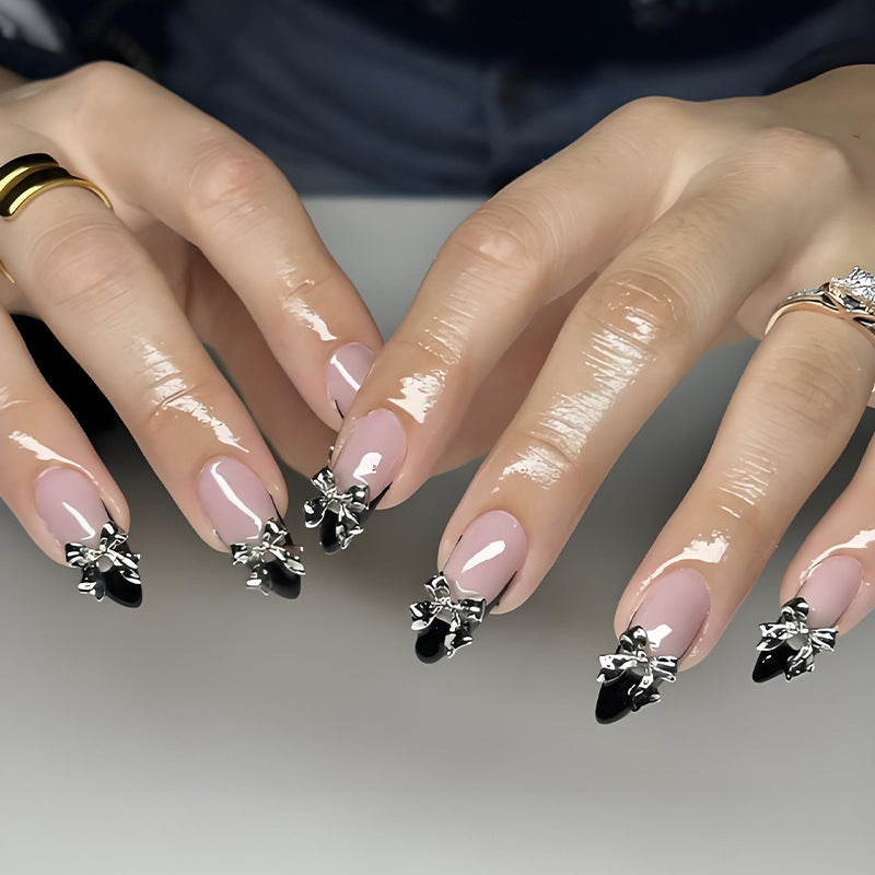Nail art set with elegant tips and artistic embellishments Stornfield