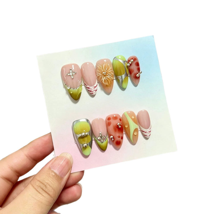 Artistic Press-On Nail Set with Decorative Floral and Gem Accents