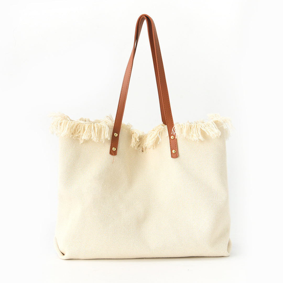 Beach bag with floral pattern and fringes Stornfield