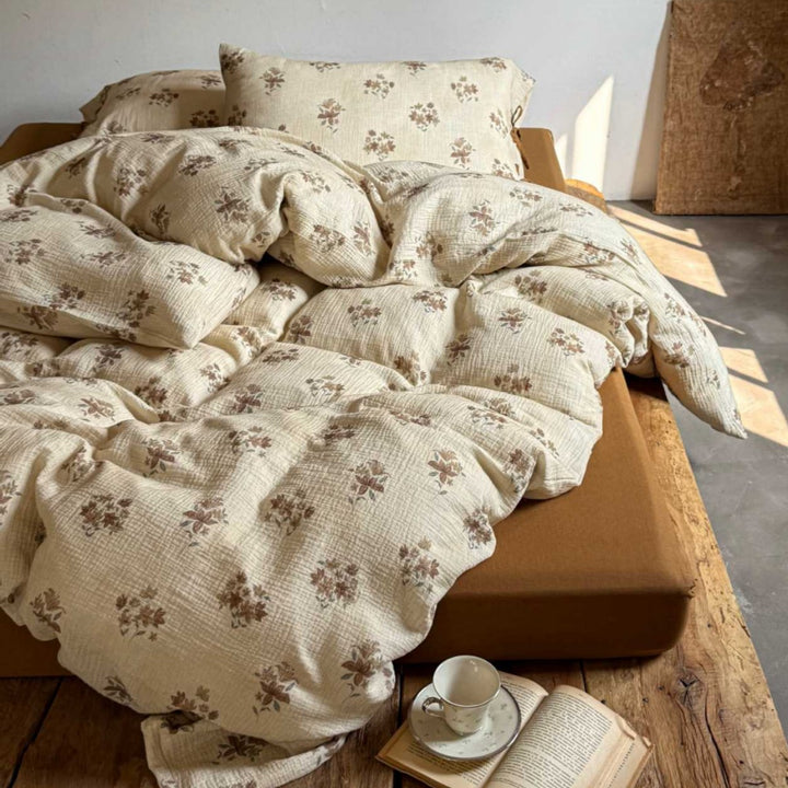 Natural cotton-linen duvet cover set with a crinkled linen look and floral tone-on-tone pattern