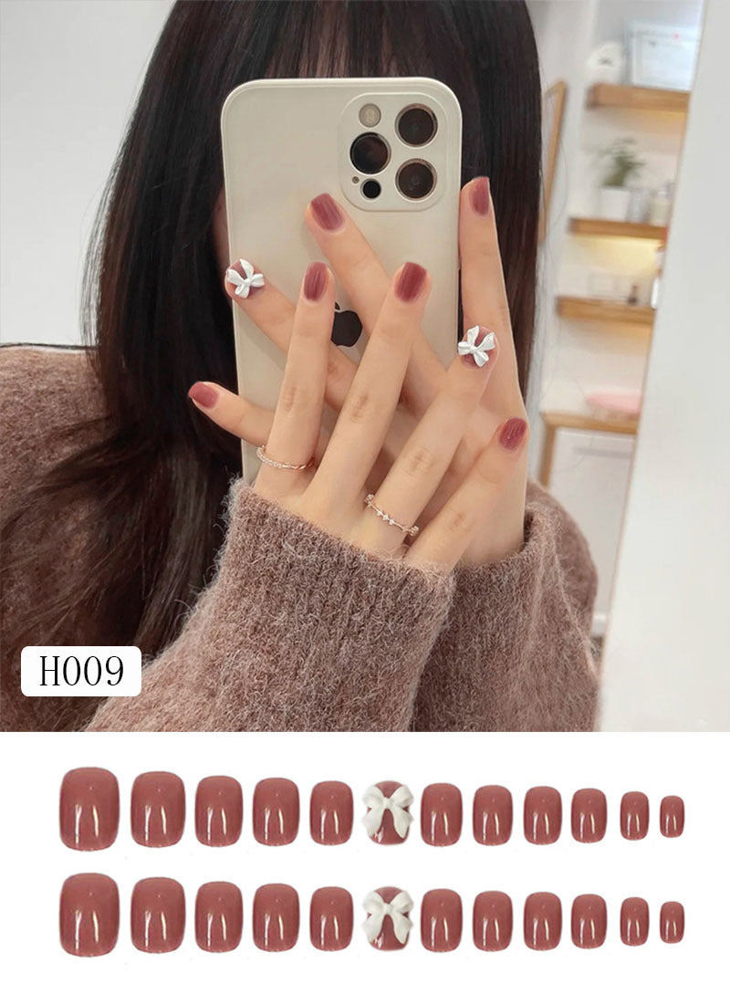 Artificial nail tips with bow design Stornfield