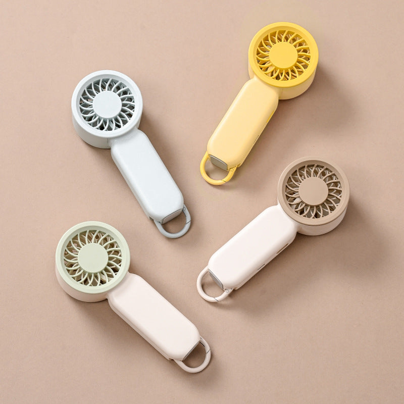 Unisex portable hand fan with rechargeable battery, quiet brushless motor, ergonomic grip, and carrying loop Stornfield