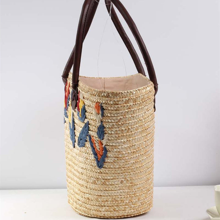 Braided beach bag with colorful embroidery pattern Stornfield