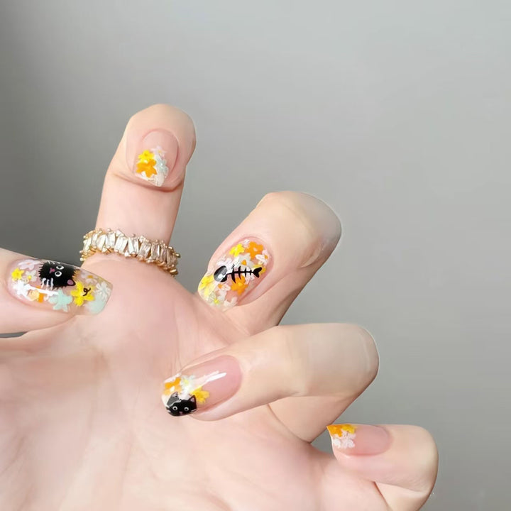Artistic Press-On Nail Set with Floral and Gemstone Accents Stornfield