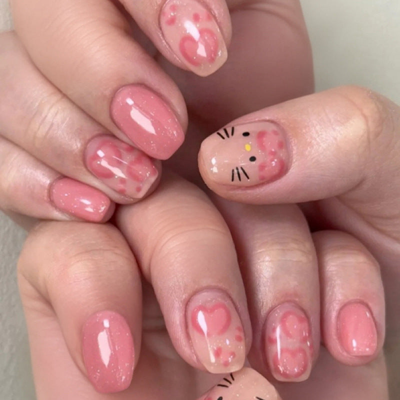 Artificial nail art with cute animal and heart motifs Stornfield