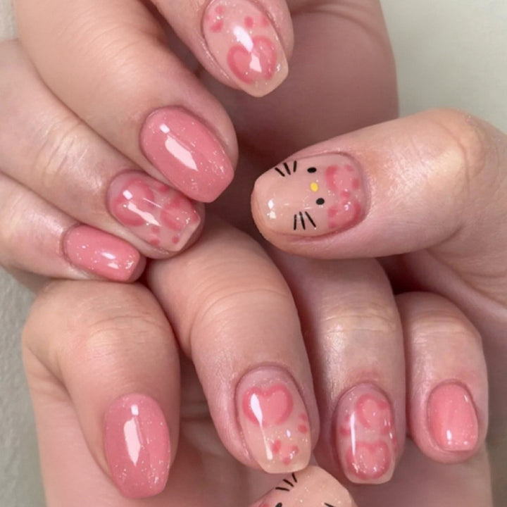 Artificial nail art with cute animal and heart motifs Stornfield