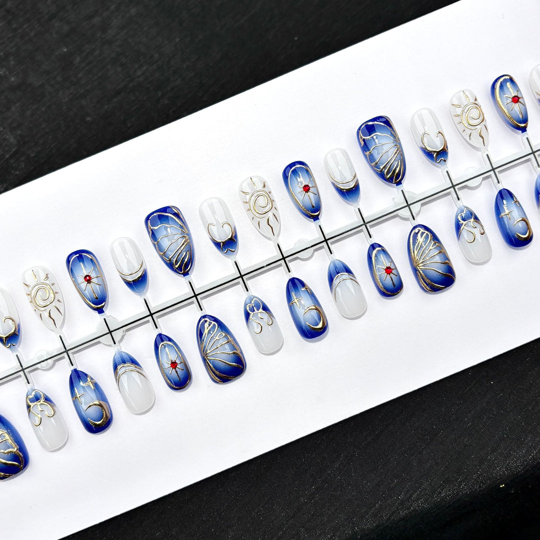 Artistic Press-On Nail Set with Elegant Gold Designs
