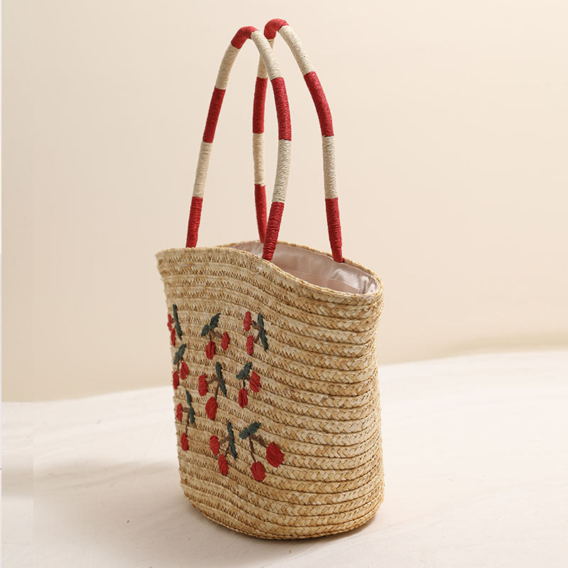 Handcrafted basket bag with vibrant floral embroidery design Stornfield
