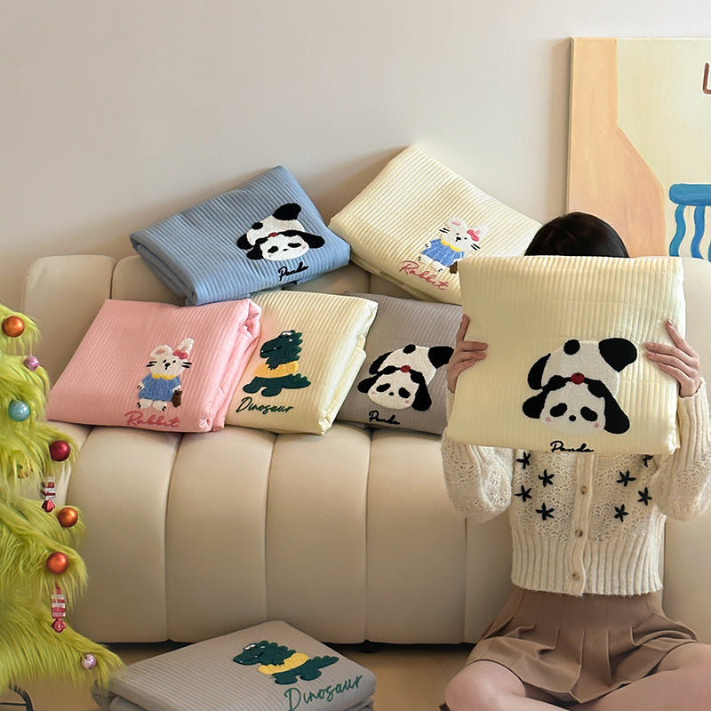 Padded mattress pad with ribbed structure, elastic fitted edge, and panda embroidery