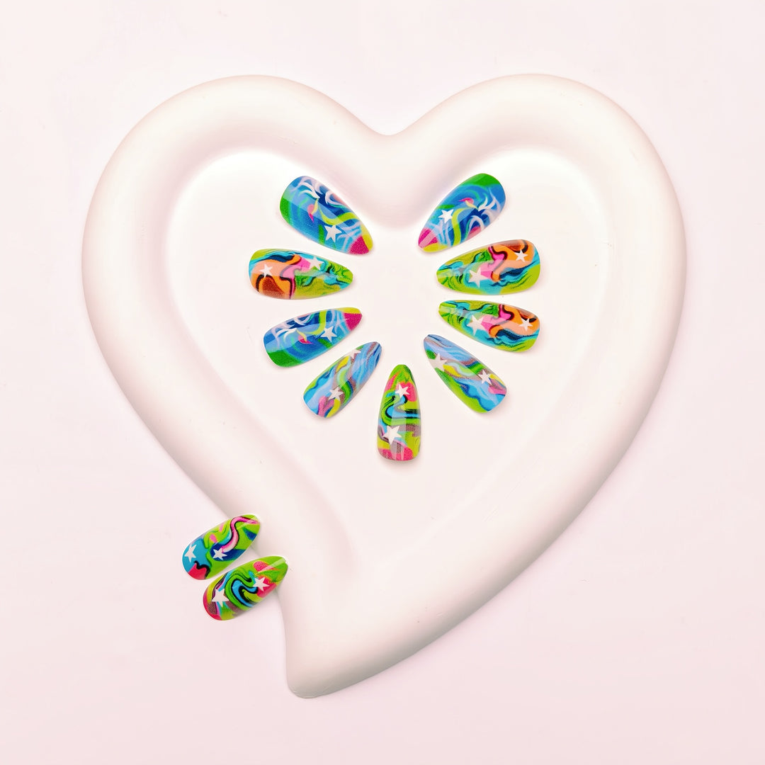 Artificial nails with creative gradient color and star motif Stornfield