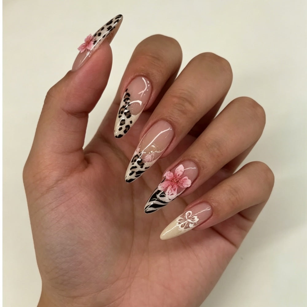 Artificial nails with floral accents and animal print Stornfield