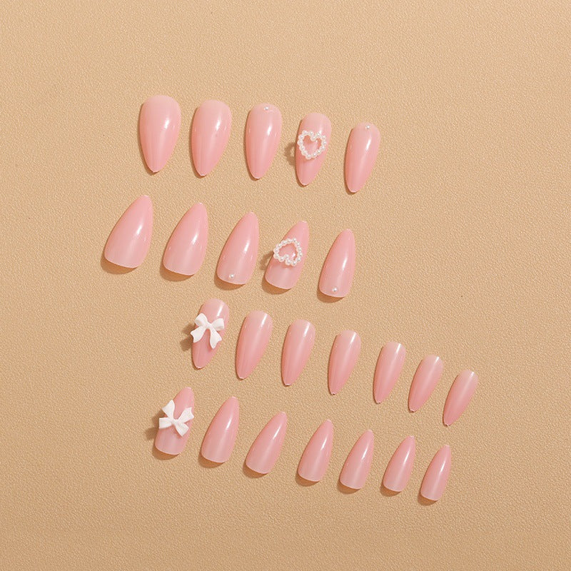 Artificial nails with 3D bow and pearl design Stornfield