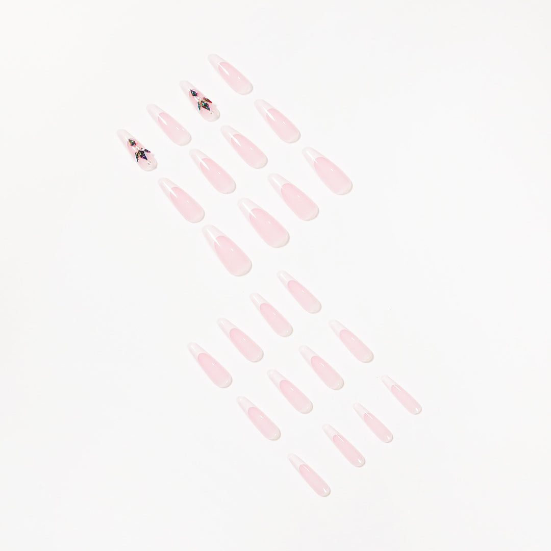 Premium Nail Extensions with Elegant Designs and Glitter Accents Stornfield