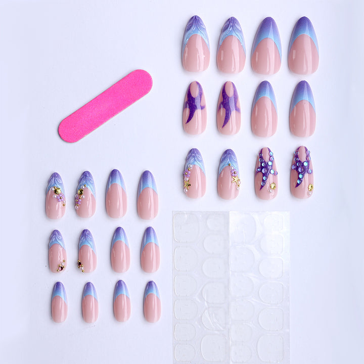 Artificial nails with maritime motifs and glitter accents Stornfield