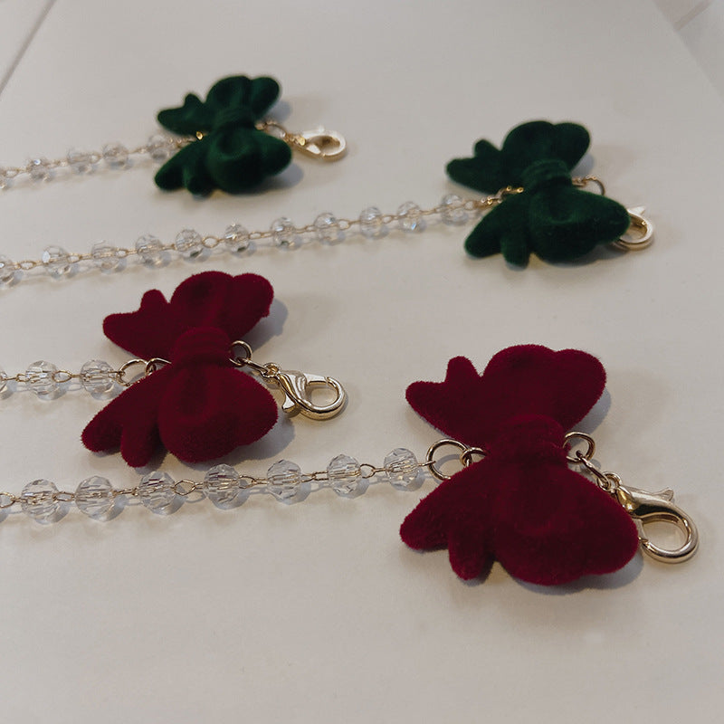 Jewelry holder chain with velvet bow pendant Stornfield