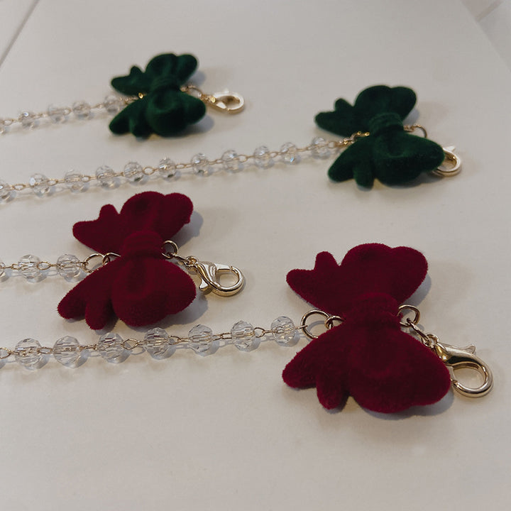 Jewelry holder chain with velvet bow pendant Stornfield