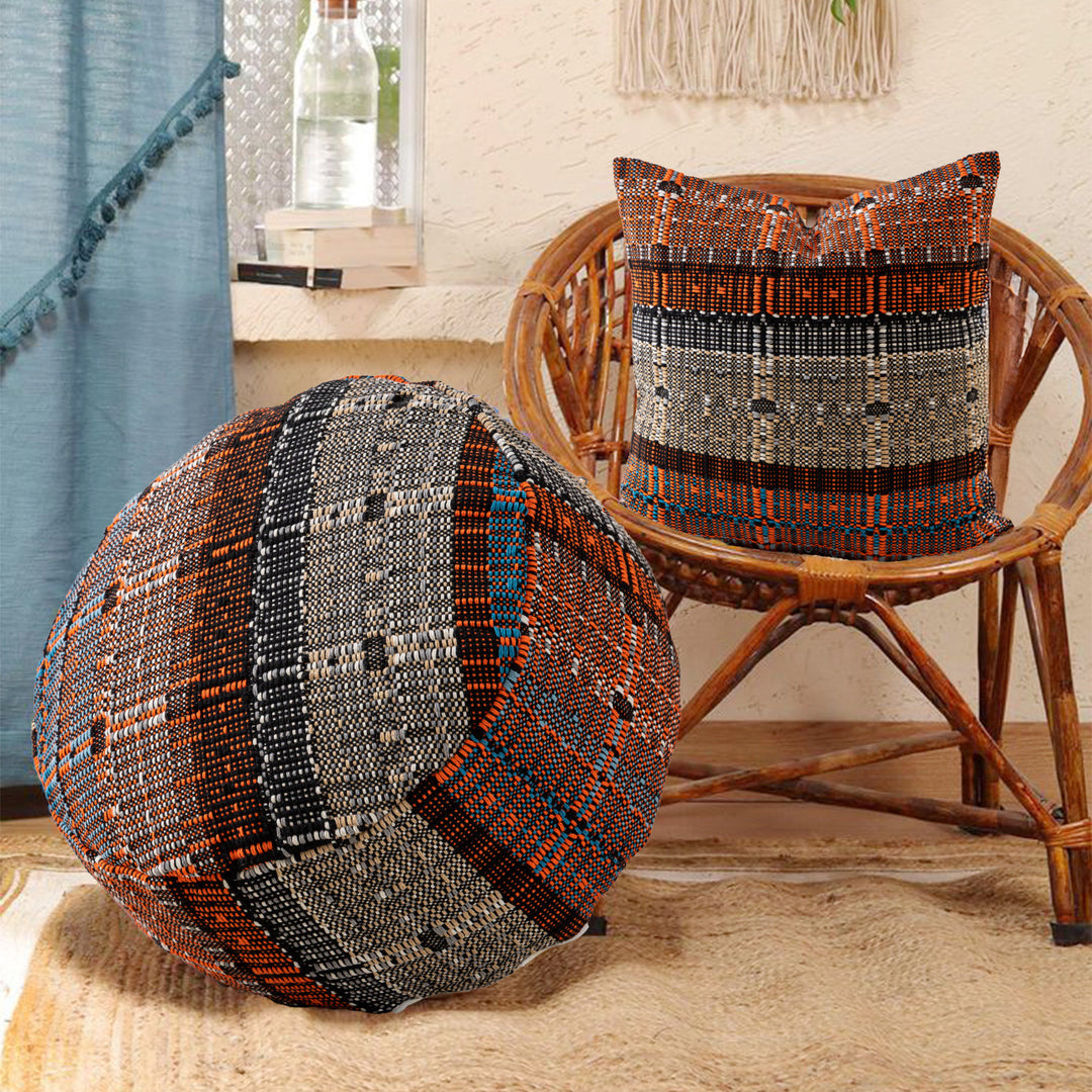 Round woven seat pouf made of durable cotton mix with practical carrying handle Stornfield