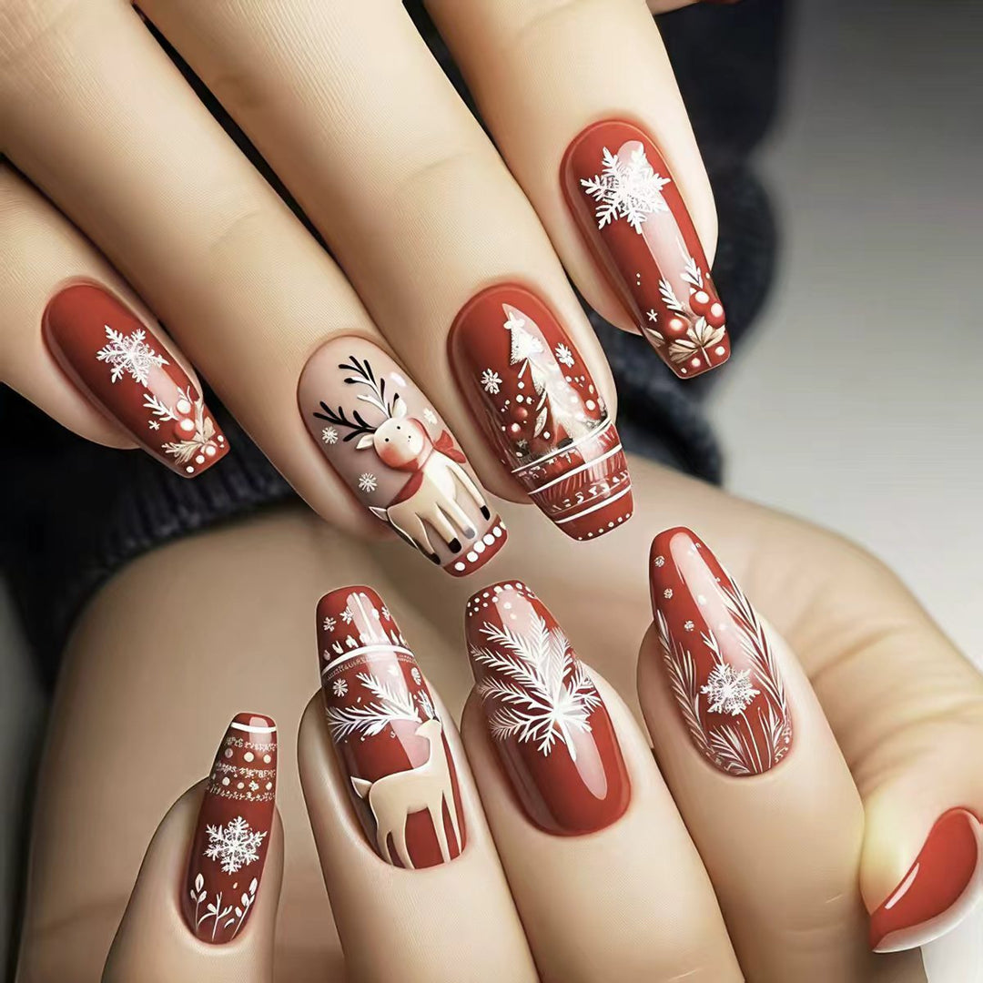 Artificial nails with festive reindeer and snowflake design Stornfield