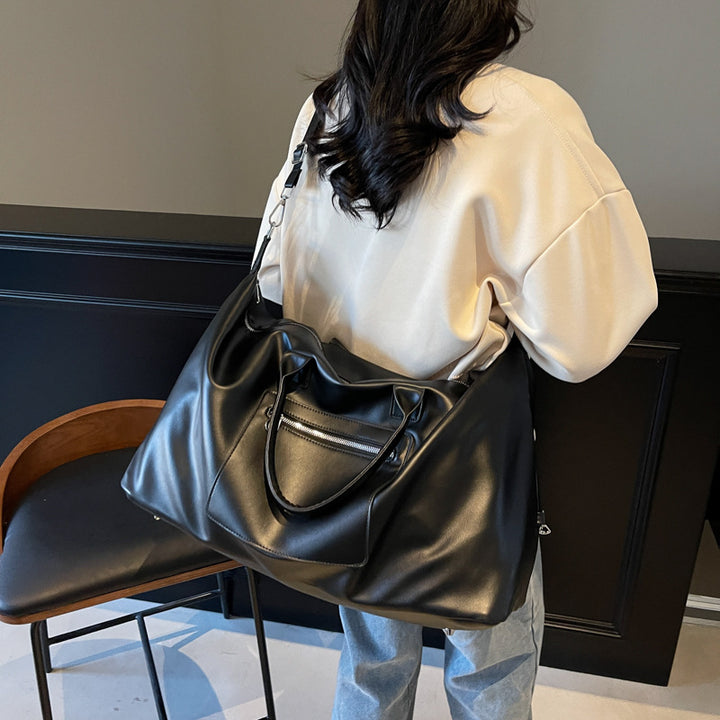 Stylish travel bag with robust design and adjustable shoulder strap Stornfield