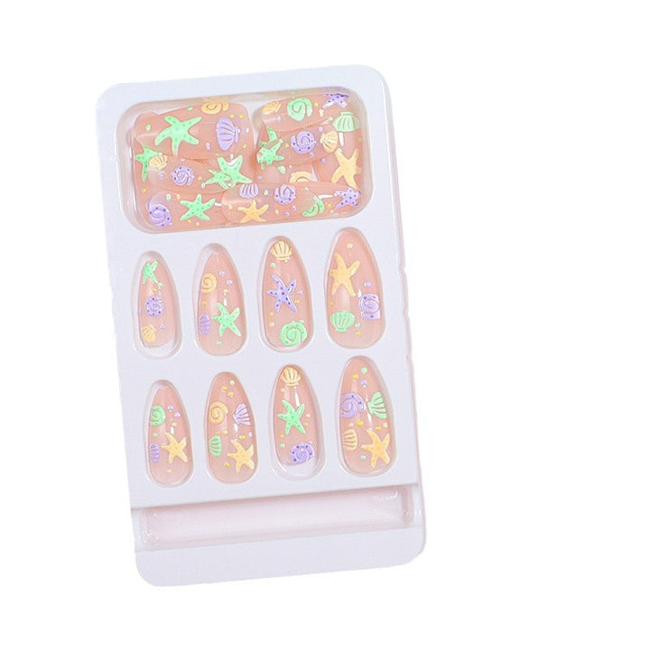 Artistic Press-On Nail Design with Ocean-Inspired Accents Stornfield